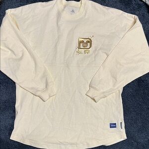Gold and white Disney world spirit jersey